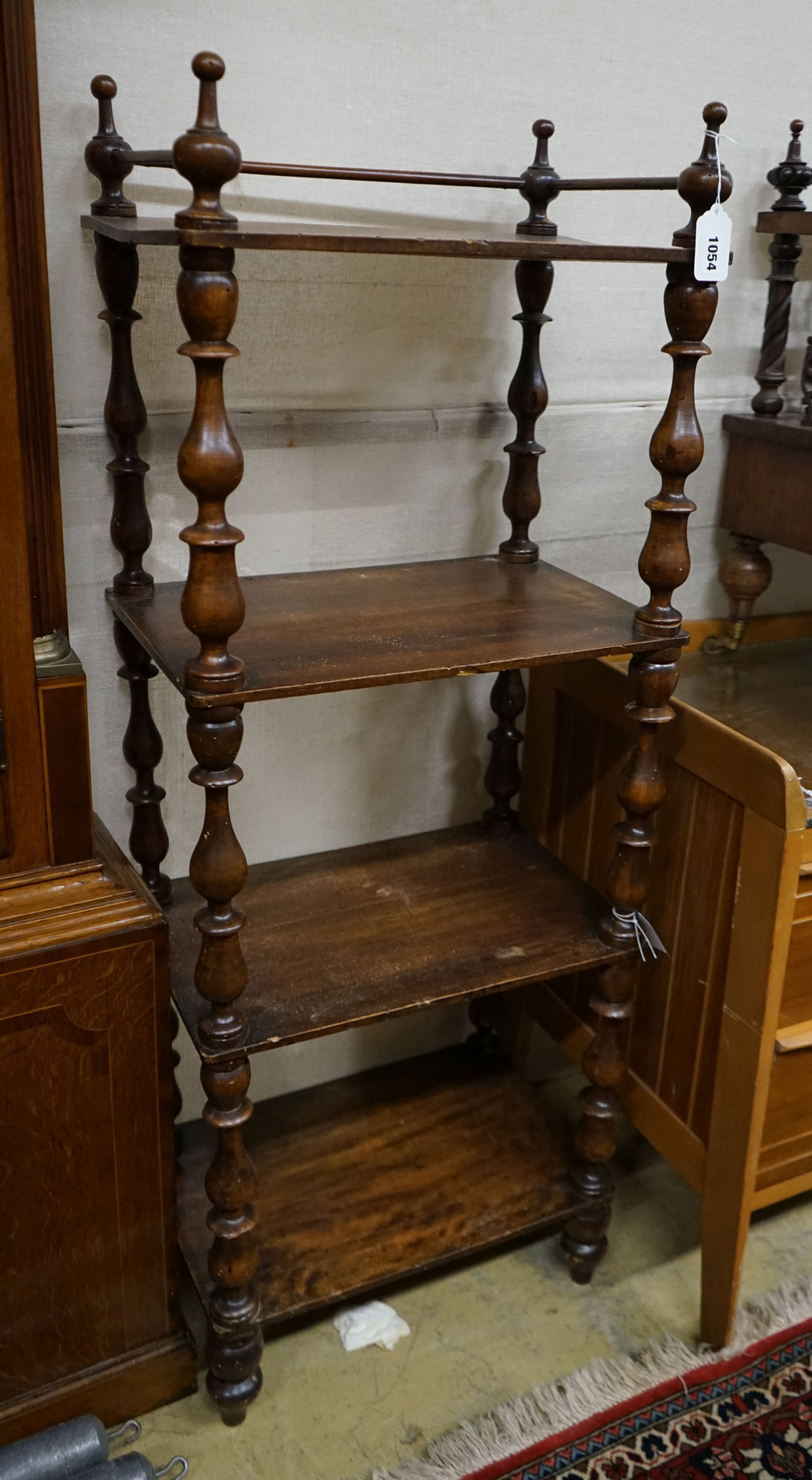 A Victorian mahogany walnut four-tier whatnot, (severely wormed) width 44cm, depth 30cm, height 118cm